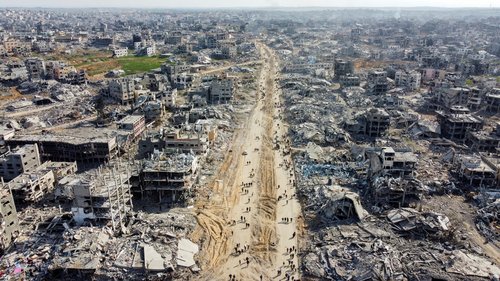 A drone view shows houses and buildings lying in ruins, following a ceasefire between Israel and Hamas, in the northern Gaza Strip