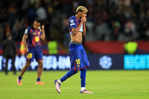 Soccer Football - UEFA Champions League - FC Barcelona v Paris St Germain - Estadi Olimpic Lluis Companys, Barcelona, Spain - October 1, 2025 FC Barcelona's Lamine Yamal looks dejected after the match REUTERS/Nacho Doce