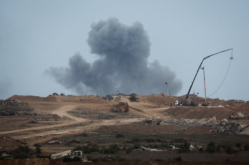 Smoke rises from Gaza, after U.S. President Donald Trump announced that Israel and Hamas agreed on the first phase of a Gaza ceasefire, as seen from the Israeli side of the border with Gaza, October 9, 2025. REUTERS/Ammar Awad