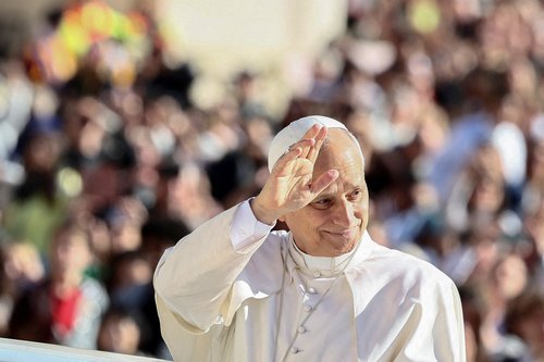 Pope Leo XIV gestures on the day of a general audience in St. Peter's Square at the Vatican