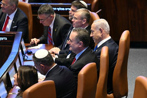 Israeli Prime Minister Benjamin Netanyahu listens