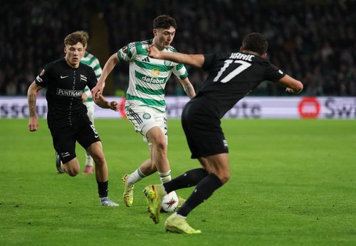 Soccer Football - UEFA Europa League - Celtic v SK Sturm Graz - Celtic Park, Glasgow, Scotland, Britain - October 23, 2025 Celtic's Colby Donovan in action with SK Sturm Graz's Emir Karic REUTERS/Russell Cheyne
