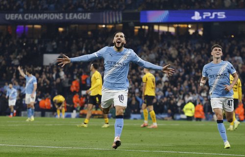 Soccer Football - UEFA Champions League - Manchester City v Borussia Dortmund - Etihad Stadium, Manchester, Britain - November 5, 2025 Manchester City's Rayan Cherki celebrates scoring their fourth goal Action Images via Reuters/Jason Cairnduff