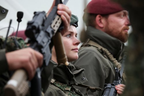 Soldiers of the EUFOR (European Union Force Bosnia and Herzegovina) stand guard in Camp Butmir, EUFOR base, near Sarajevo