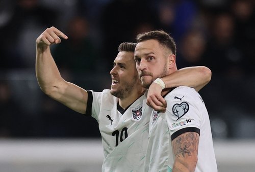 Soccer Football - FIFA World Cup - UEFA Qualifiers - Group H - Cyprus v Austria - Alphamega Stadium, Limassol, Cyprus - November 15, 2025 Austria's Marko Arnautovic celebrates scoring their second goal with Christoph Baumgartner REUTERS/Yiannis Kourtoglou