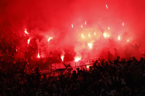Soccer Football - FIFA World Cup - UEFA Qualifiers - Group H - Austria v Bosnia and Herzegovina - Ernst-Happel-Stadion, Vienna, Austria - November 18, 2025 Bosnia and Herzegovina fans let off flares as they celebrate their first goal scored by Haris Tabak