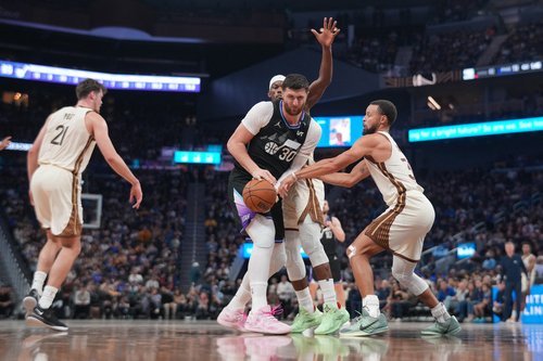 Nov 24, 2025; San Francisco, California, USA; Utah Jazz center Jusuf Nurkic (30) holds onto the ball next to Golden State Warriors guard Stephen Curry (30) in the third quarter at the Chase Center. Mandatory Credit: Cary Edmondson-Imagn Images