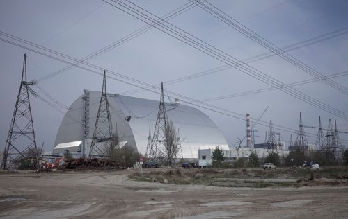 FILE PHOTO: A general view shows a New Safe Confinement structure over the old sarcophagus covering the damaged fourth reactor at the Chernobyl nuclear power plant, in Chernobyl