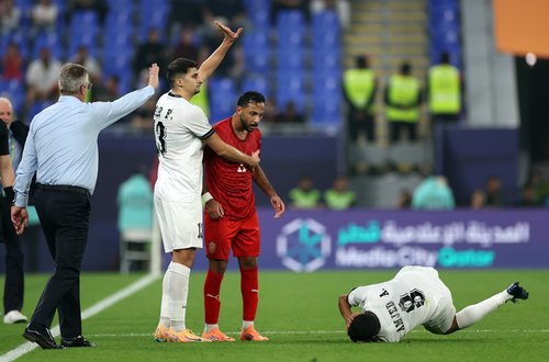 Soccer Football - FIFA Arab Cup - Qatar 2025 - Group D - Iraq v Bahrain - Stadium 974, Doha, Qatar - December 3, 2025 Iraq's Amjad Attwan reacts after a challenge REUTERS/Thaier Al-Sudani