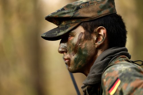 A recruit listens to instructions at a training drill during a media day at the Reconnaissance Battalion, Ahlen, Germany, November 13, 2025. REUTERS/Leon Kuegeler
