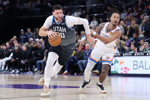 Dec 7, 2025; Salt Lake City, Utah, USA; Utah Jazz center Jusuf Nurkic (30) drives to the basket against Oklahoma City Thunder forward Jaylin Williams (6) during the second half at Delta Center. Mandatory Credit: Rob Gray-Imagn Images