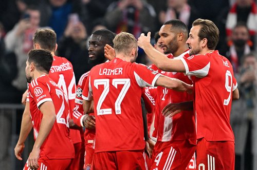 Soccer Football - UEFA Champions League - Bayern Munich v Sporting CP - Allianz Arena, Munich, Germany - December 9, 2025 Bayern Munich's Jonathan Tah celebrates scoring their third goal with teammates REUTERS/Angelika Warmuth