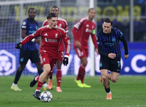 Soccer Football - UEFA Champions League - Inter Milan v Liverpool - San Siro, Milan, Italy - December 9, 2025 Liverpool's Florian Wirtz in action with Inter Milan's Piotr Zielinski REUTERS/Claudia Greco
