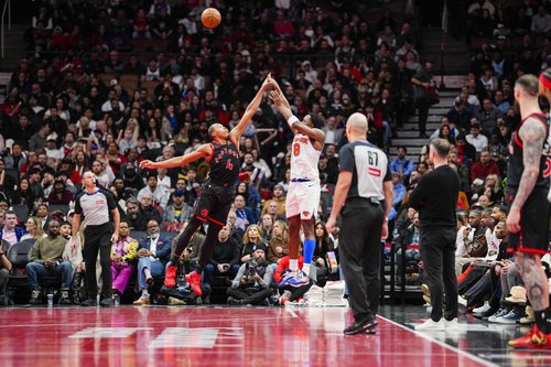Dec 9, 2025; Toronto, Ontario, CAN; New York Knicks forward Og Anunoby (8) shoots over Toronto Raptors forward Scottie Barnes (4) during the second half at the 2025-26 NBA Emirates Cup at Scotiabank Arena. Mandatory Credit: Kevin Sousa-Imagn Images