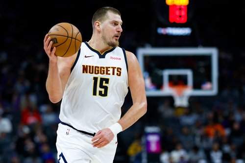 Dec 11, 2025; Sacramento, California, USA; Denver Nuggets center Nikola Jokic (15) controls the ball against the Sacramento Kings during the third quarter at Golden 1 Center. Mandatory Credit: Sergio Estrada-Imagn Images