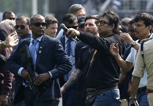 Soccer Football - Argentine soccer star Lionel Messi on a whirlwind tour of India - Vivekananda Yuva Bharati Krirangan, Kolkata, India - December 13, 2025 Argentine soccer star Lionel Messi and organiser Satadru Dutta at the stadium during his tour of Ind