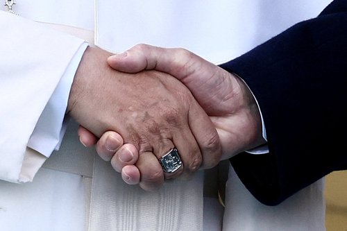 Pope Leo XIV shakes hands with Turkish President Tayyip Erdogan