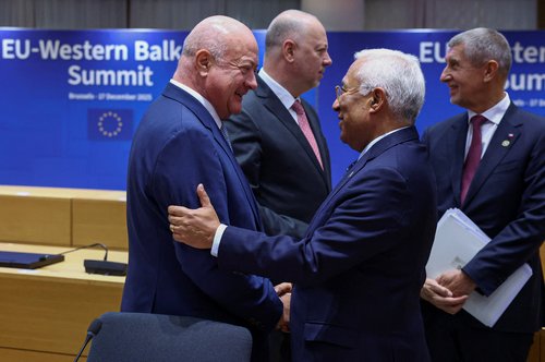 European Council President Antonio Costa shake hands with
