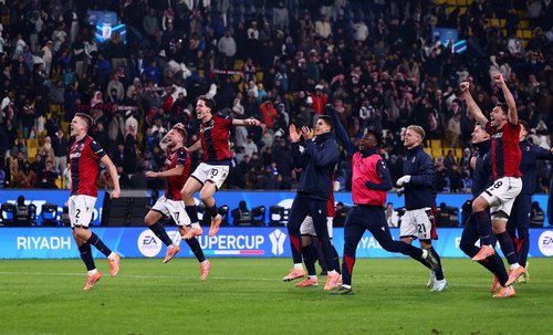 Soccer Football - Supercoppa Italiana - Semi Final - Bologna v Inter Milan - Al Awwal Park, Riyadh, Saudi Arabia - December 20, 2025 Bologna's Emil Holm, Ciro Immobile, Giovanni Fabbian with teammates celebrate after the match REUTERS/Guglielmo Mangiapane