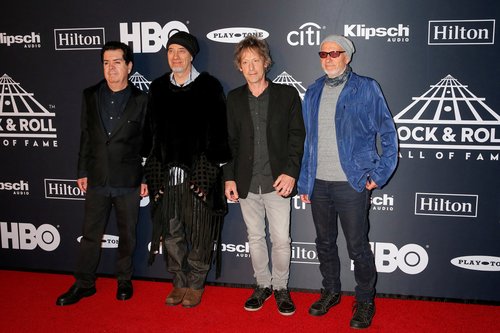 FILE PHOTO: (L-R) Inductees Lol Tolhurst, Michael Dempsey, Perry Bamonte and Boris Williams of The Cure attend the 2019 Rock and Roll Hall of Fame induction ceremony in Brooklyn, New York, U.S., March 29, 2019. REUTERS/Eduardo Munoz/File Photo