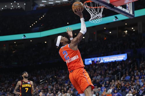 Dec 29, 2025; Oklahoma City, Oklahoma, USA; Oklahoma City Thunder guard Shai Gilgeous-Alexander (2) goes up for a basket against the Atlanta Hawks during the second half at Paycom Center. Mandatory Credit: Alonzo Adams-Imagn Images