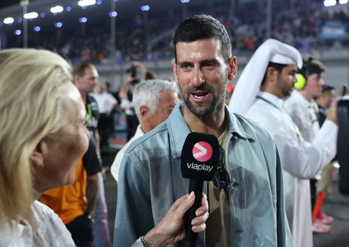 Formula One F1 - Qatar Grand Prix - Lusail International Circuit, Lusail, Qatar - November 30, 2025 Tennis player Novak Djokovic is interviewed on the grid before of the race REUTERS/Jakub Porzycki