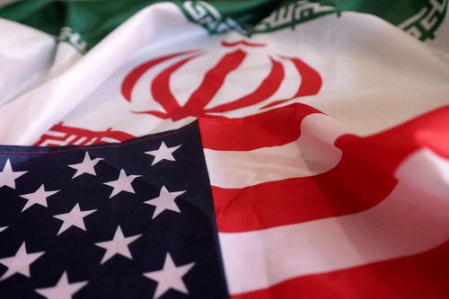 FILE PHOTO: Illustration shows USA and Iranian flags