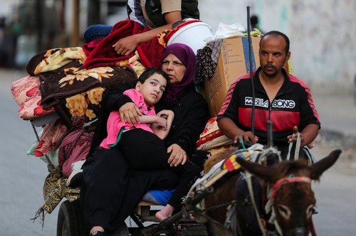 Palestinians flee Rafah due to an Israeli military operation, in Rafah, in the southern Gaza Strip