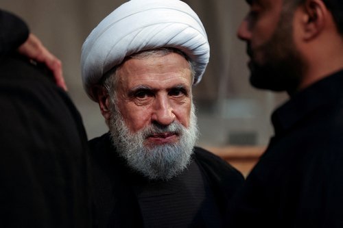 FILE PHOTO: Lebanon's Hezbollah deputy leader Sheikh Naim Qassem accepts condolences for the death of Hezbollah senior commander Fuad Shukr, in Beirut's southern suburbs