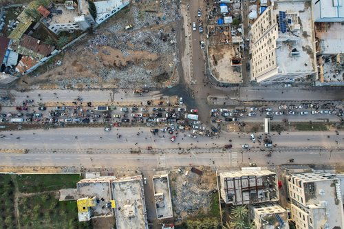 A drone view shows displaced Palestinians waiting to be allowed to return to their homes in northern Gaza, in the central Gaza Strip