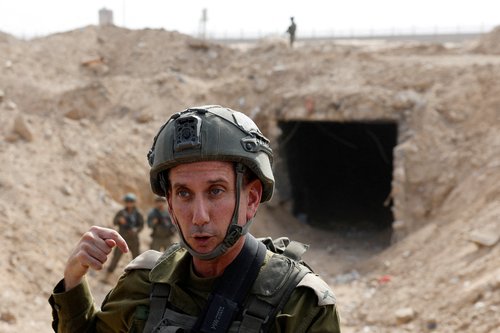 FILE PHOTO: IDF spokesperson Daniel Hagari speaks at the entrance to a tunnel leading to Egypt, in the Philadelphi Corridor area in southern Gaza
