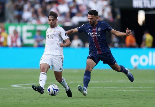 Soccer Football - FIFA Club World Cup - Semi Final - Paris St Germain v Real Madrid - MetLife Stadium, East Rutherford, New Jersey, U.S. - July 9, 2025 Real Madrid's Raul Asencio in action with Paris St Germain's Goncalo Ramos REUTERS/Lee Smith