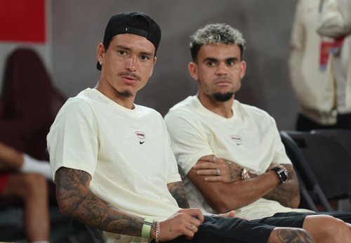 Soccer Football - Pre-Season Friendly - Liverpool v AC Milan - Kai Tak Sports Park, Hong Kong, China - July 26, 2025 Liverpool's Darwin Nunez and Luis Diaz before the match REUTERS/Tyrone Siu