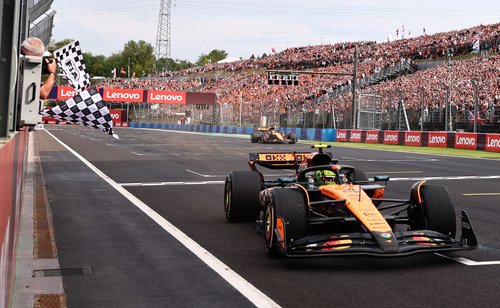 Formula One F1 - Hungarian Grand Prix - Hungaroring, Budapest, Hungary - August 3, 2025 McLaren's Lando Norris passes the chequered flag to win the Hungarian Grand Prix Pool via REUTERS/Anna Szilagyi