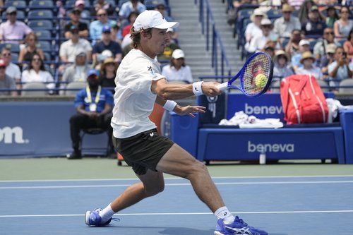 Aug 3, 2025; Toronto, ON, Canada; Alex De Minaur (AUS) returns a ball to Frances Tiafoe (not pictured) during round four at Sobeys Stadium. Mandatory Credit: John E. Sokolowski-Imagn Images