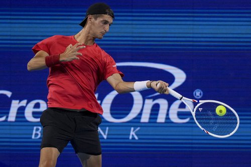 Aug 14, 2025; Cincinnati, OH, USA; Terence Atmane (FRA) returns a shot against Holger Rune (DEN) during the Cincinnati Open at the Lindner Family Tennis Center. Mandatory Credit: Aaron Doster-Imagn Images
