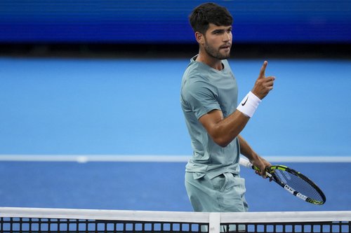 Aug 16, 2025; Cincinnati, OH, USA; Carlos Alcaraz (ESP) reacts after returning a shot against Alexander Zverev (GER) during the Cincinnati Open at the Lindner Family Tennis Center. Mandatory Credit: Aaron Doster-Imagn Images
