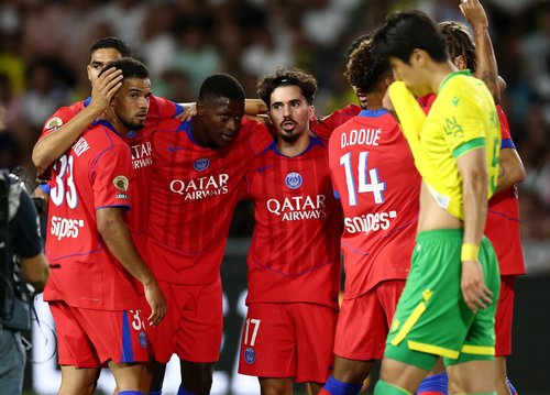 Soccer Football - Ligue 1 - Nantes v Paris St Germain - The Stade de la Beaujoire - Louis Fonteneau, Nantes, France - August 17, 2025 Paris St Germain's Vitinha celebrates scoring their first goal with teammates REUTERS/Stephane Mahe