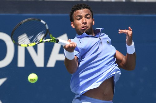 Aug 1, 2025; Toronto, ON, Canada; Arthur Fils (FRA) plays a shot against Jiri Lehecka (CZE) during third round play at Sobeys Stadium. Mandatory Credit: Dan Hamilton-Imagn Images