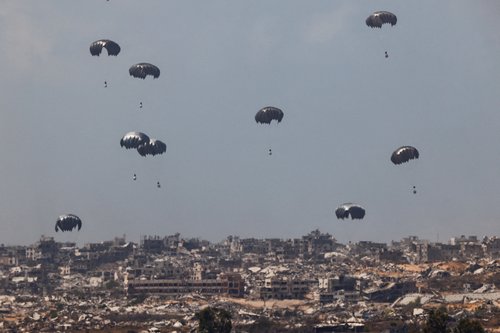 Humanitarian aid packages, dropped from an Indonesian Hercules aircraft gaza REUTERS/Amir Cohen