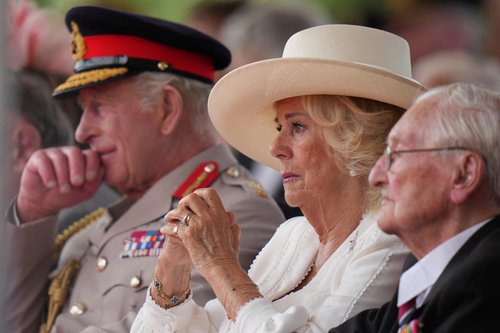 Britain's King Charles and Queen Camilla attend a Service of Remembrance at the National Memorial Arboretum to commemorate the 80th Anniversary of