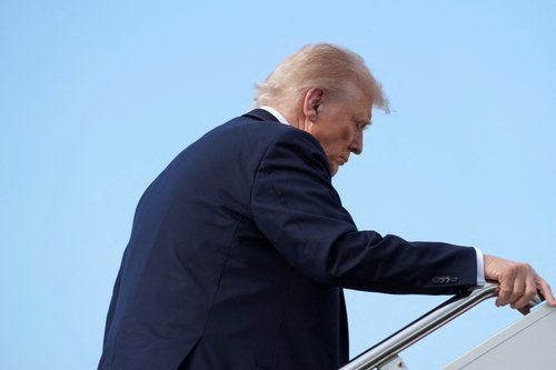U.S. President Donald Trump boards Air Force One