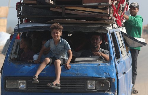 Displaced Palestinians, fleeing northern Gaza due to an Israeli military operation