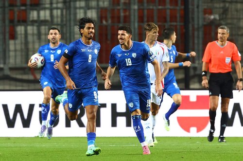 Soccer Football - World Cup - UEFA Qualifiers - Group I - Israel v Italy - Nagyerdei Stadion, Debrecen, Hungary - September 8, 2025 Israel's Dor Peretz celebrates scoring their fourth goal REUTERS/Bernadett Szabo