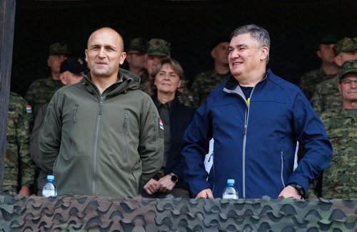 Croatia's Defence Minister Ivan Anusic and President Zoran Milanovic before the "Borbena moc 25" (Combat Power 25) military exercise in Slunj, Croatia, September, 17, 2025. REUTERS/Antonio Bronic