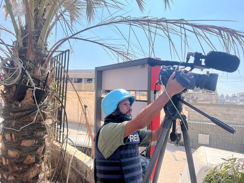 FILE PHOTO: Reuters cameraman Hussam al-Masri, who was killed in Israeli strikes on Nasser hospital on August 25, 2025, works at Nasser hospital, in Khan Younis in the southern Gaza Strip August 7, 2024. REUTERS/Stringer/File Photo