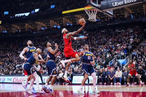 Dec 31, 2025; Toronto, Ontario, CAN; Toronto Raptors forward Brandon Ingram (3) drives to the basket against Denver Nuggets forward Spencer Jones (21) during the first half at Scotiabank Arena. Mandatory Credit: Kevin Sousa-Imagn Images