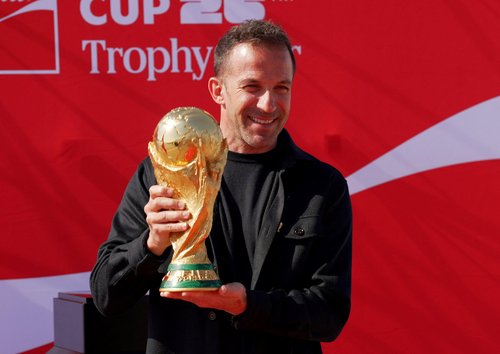 Soccer Football - FIFA World Cup 2026 trophy arrives in Riyadh - Riyadh, Saudi Arabia - January 3, 2026 Former footballer Alessandro Del Piero poses with the FIFA World Cup 2026 trophy REUTERS/Mohammed Benmansour