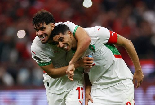Soccer Football - CAF Africa Cup of Nations - Morocco 2025 - Quarter Final - Morocco v Cameroon - Prince Moulay Abdellah Stadium, Rabat, Morocco - January 9, 2026 Morocco's Achraf Hakimi and Morocco's Abde Ezzalzouli celebrate after the match REUTERS/Siph