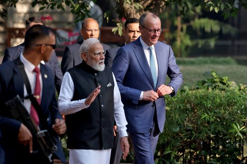 German Chancellor Friedrich Merz walks with India's Prime Minister Narendra Modi during his visit to Gandhi Ashram in Ahmedabad, India